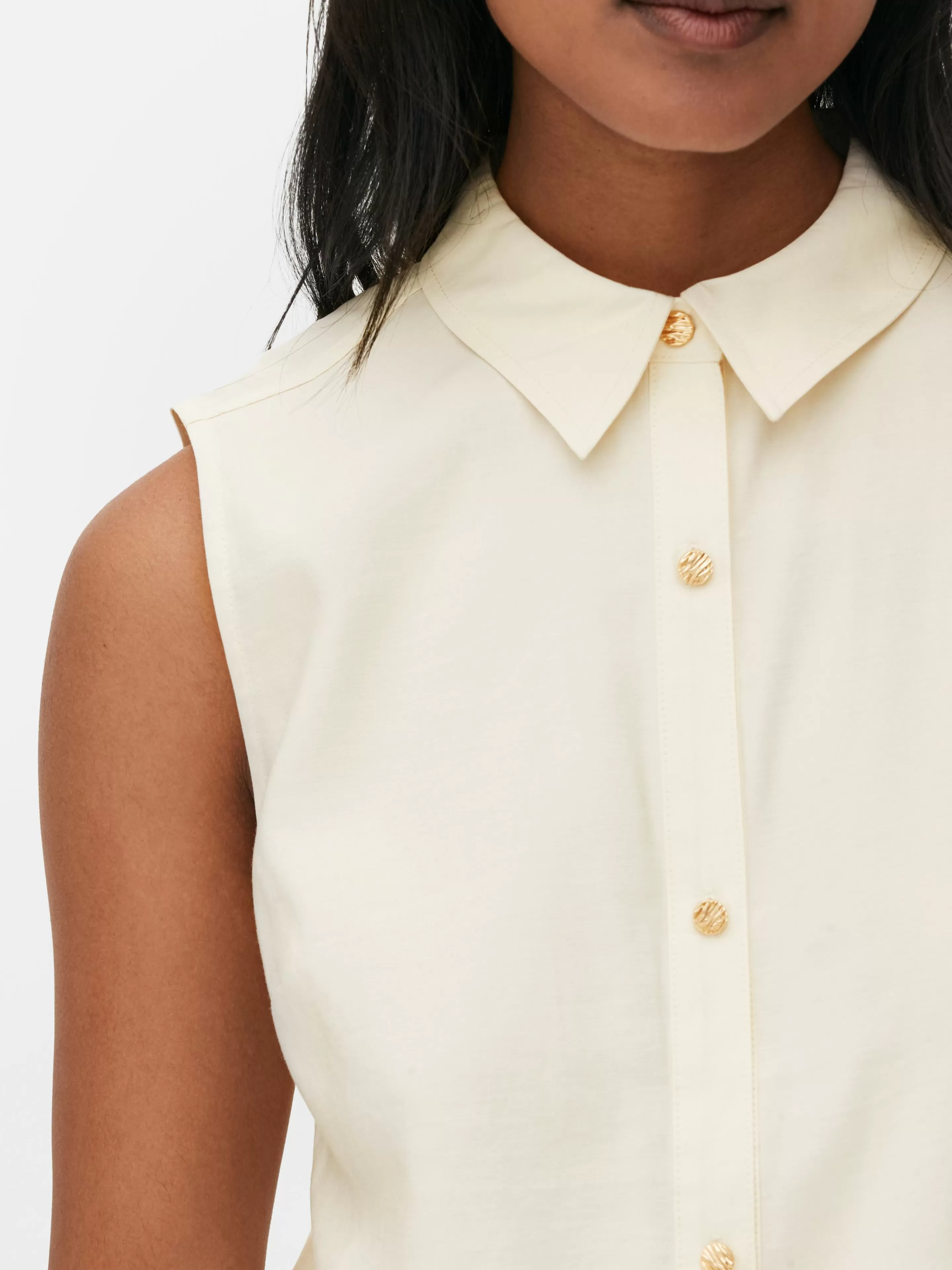 Blusa Primark senza maniche con bottoni avorio - Camicie e top eleganti per ogni occasione