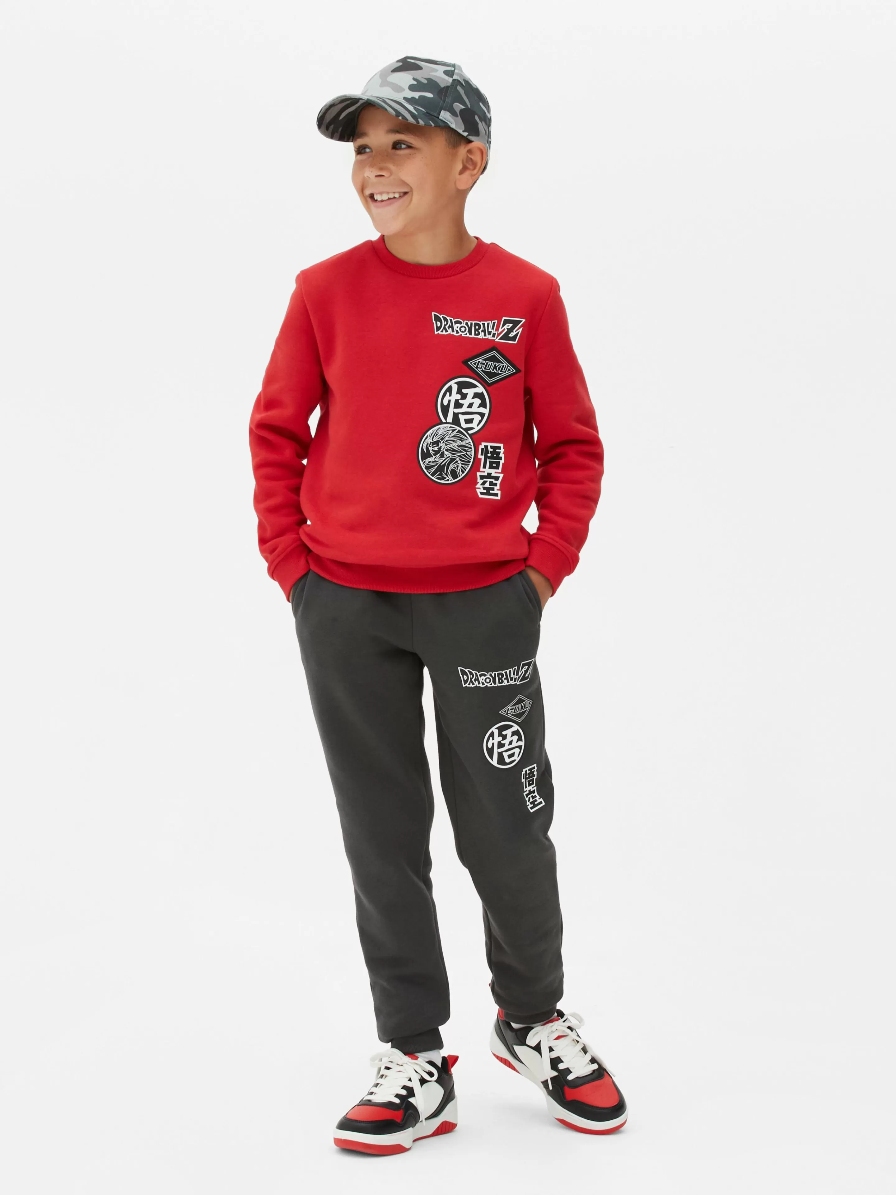 Completo Sportivo Goku Dragon Ball Z - Tuta da Allenamento in Rosso Energetico, Primark