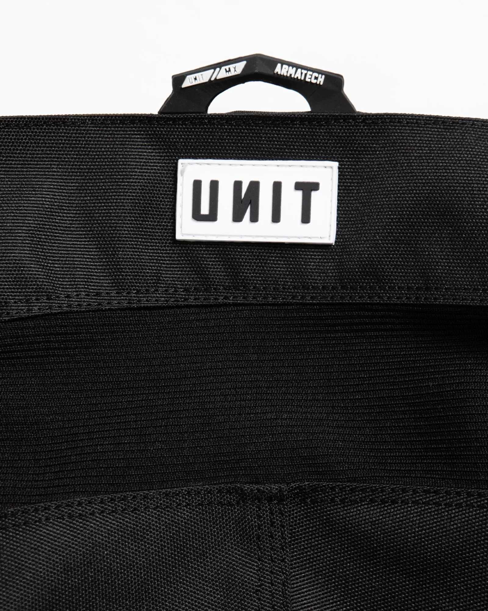 Pantaloni Tech Stack MX Uomo - Nero Assoluto | Comfort Estremo | Tasca Multifunzione | Modello Urban di UNIT Clothing | Tessuto Leggero e Resistente